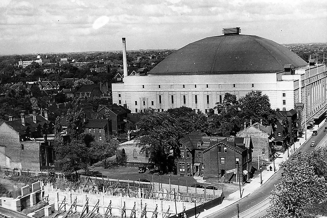 Vintage 1930s photo of Maple Leaf Gardens' domed exterior under construction in Toronto, public domain.
