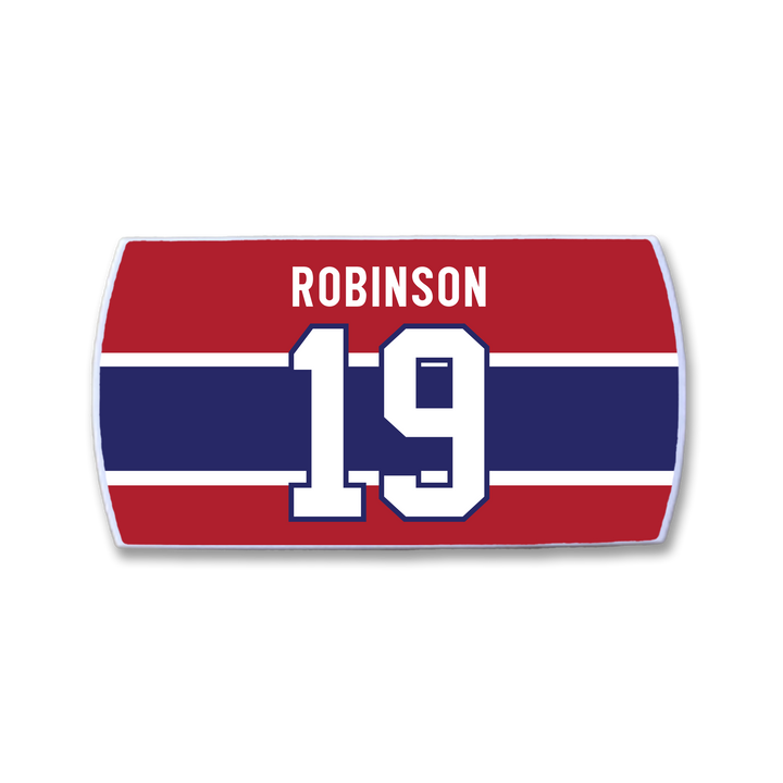 The ZippyBack™ Larry Robinson hockey jersey nameplate features ROBINSON in white above a large white 19 outlined in blue on red, white, and blue with a bold central blue stripe, honoring the legendary defenseman’s legacy.