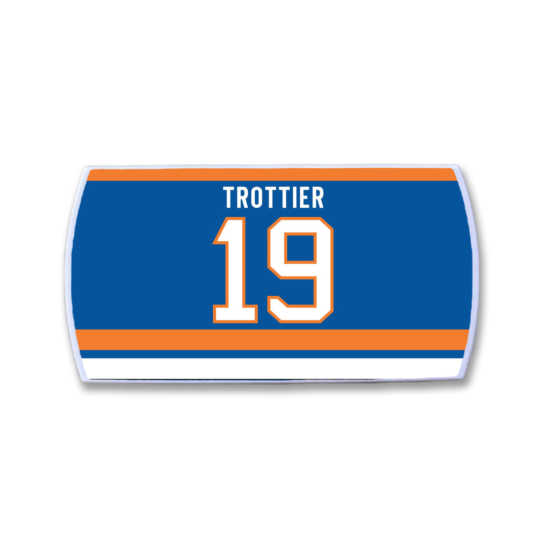 The ZippyBack™ Bryan Trottier patch is a blue hockey jersey patch with orange and white stripes, featuring TROTTIER and the number 19 in bold white letters outlined in orange.