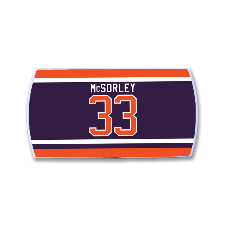 The ZippyBack™ Marty McSorley hockey-style nameplate displays his name and number 33 in bold white and orange on a navy background, accented with red and white stripes.