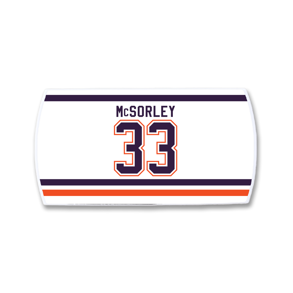 ZippyBack™ Marty McSorley nameplate features bold number 33 and enforcer's name on a white hockey jersey, accented with navy blue, orange, and white stripes at the top and bottom.