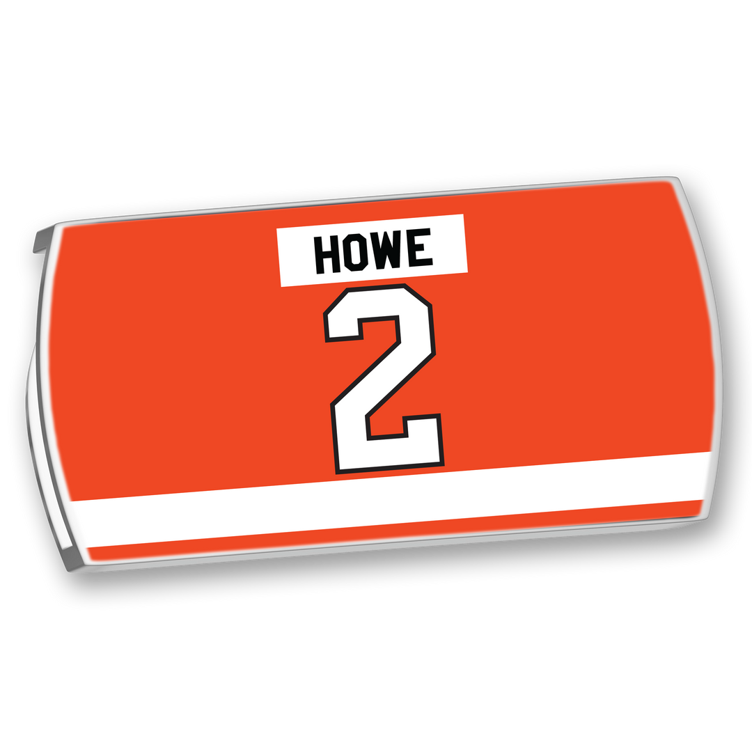 The ZippyBack™ Mark Howe jersey is orange with a white stripe near the bottom, displaying "Mark Howe" and the bold number 2—honoring the legendary defenseman's skillful play.