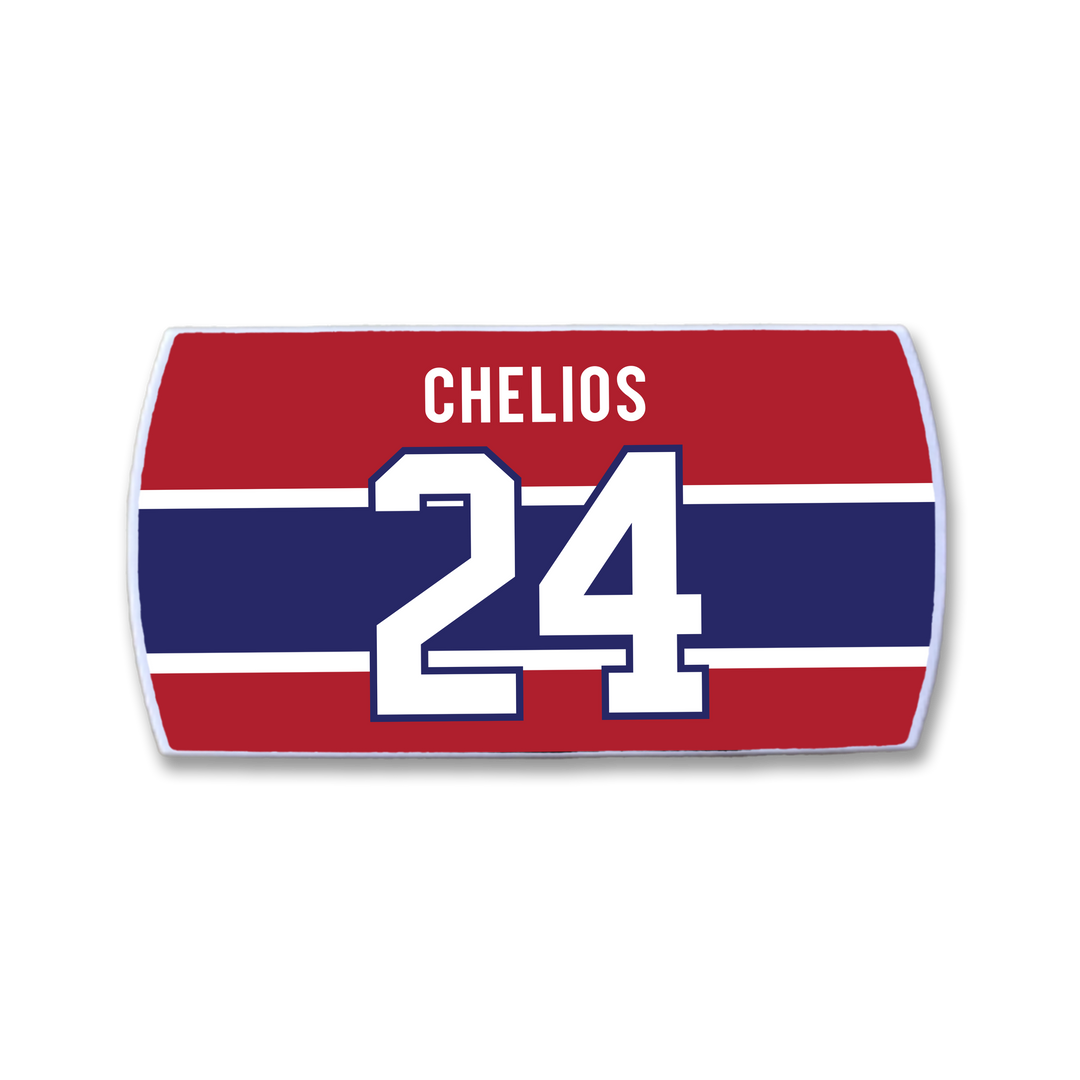 The ZippyBack™ Chris Chelios hockey jersey nameplate features "CHELIOS" above the number 24 in white block letters, honoring the legendary defenseman’s enduring legacy on the ice.