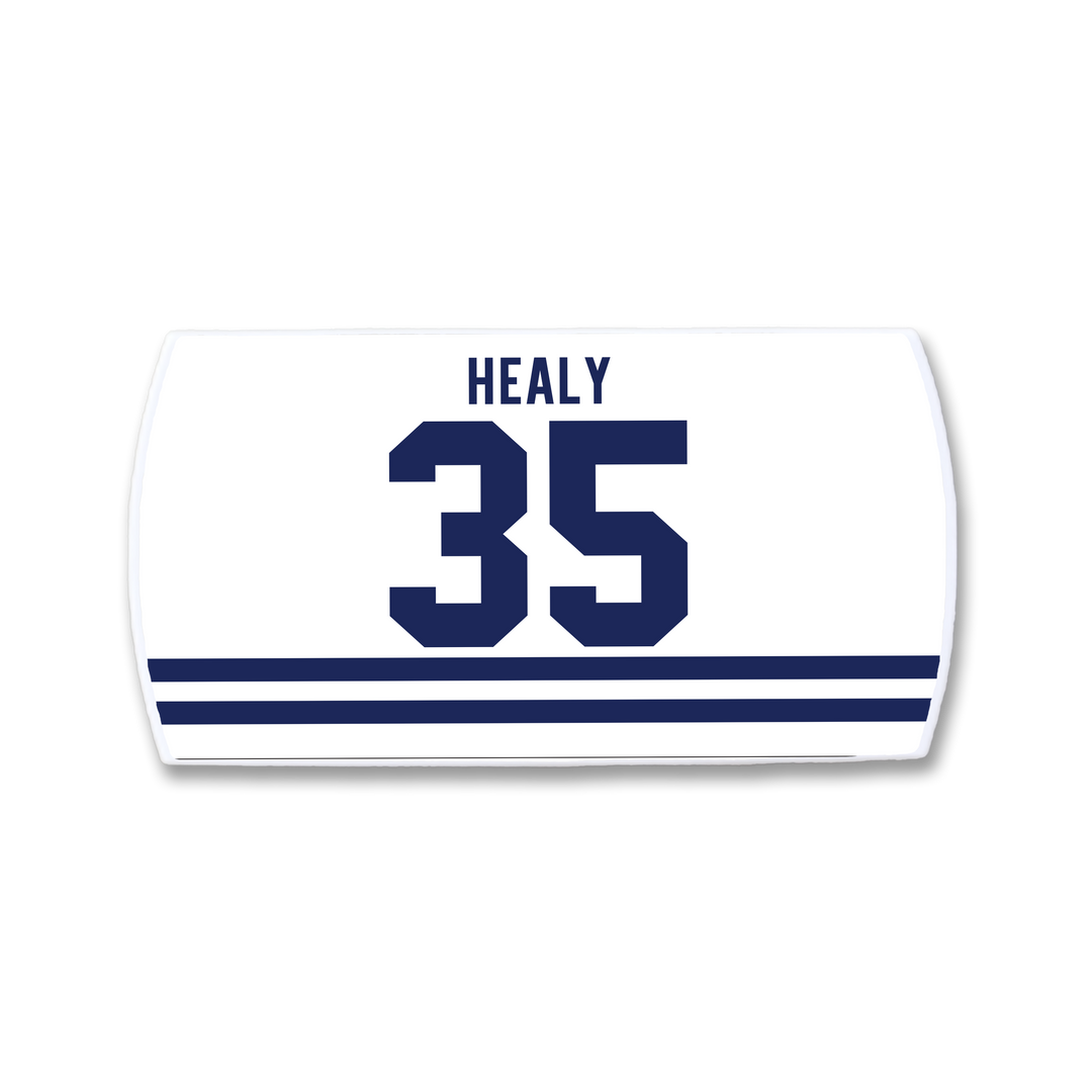 The ZippyBack™ Glenn Healy jersey is a white sports top with dark blue stripes, displaying "Healy" and the number 35 in bold blue from his NHL career.