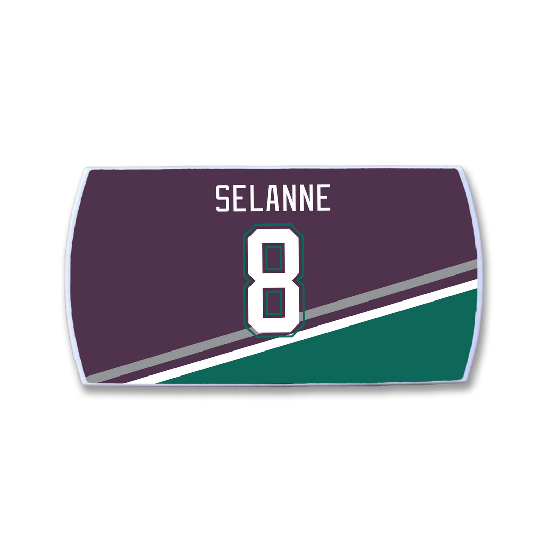 The ZippyBack™ Teemu Selänne nameplate features white letters and the number 8 on a dark purple background with diagonal teal and white stripes.