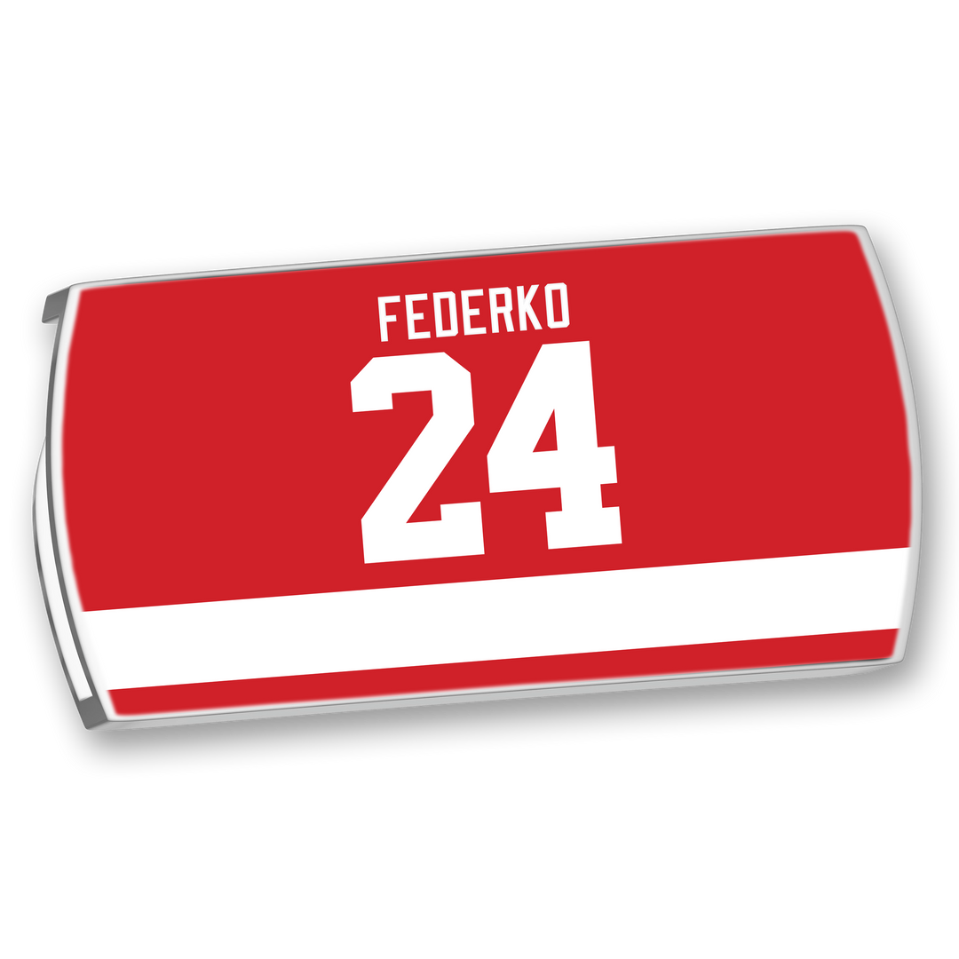 The ZippyBack™ Bernie Federko jersey nameplate features bold white FEDERKO and number 24 on red, accented with a horizontal white stripe—a nod to Bernie Federko’s skillful control and passing on the ice.