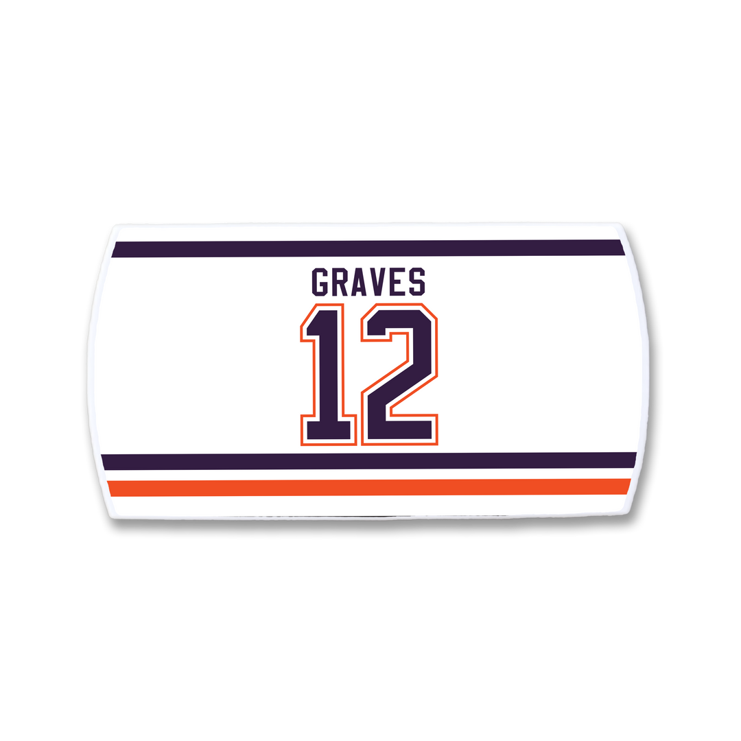 The ZippyBack™ Adam Graves nameplate features "GRAVES" in bold black above the number 12 in orange with a navy outline, set on white and flanked by dynamic navy and orange stripes that capture the game’s intensity.