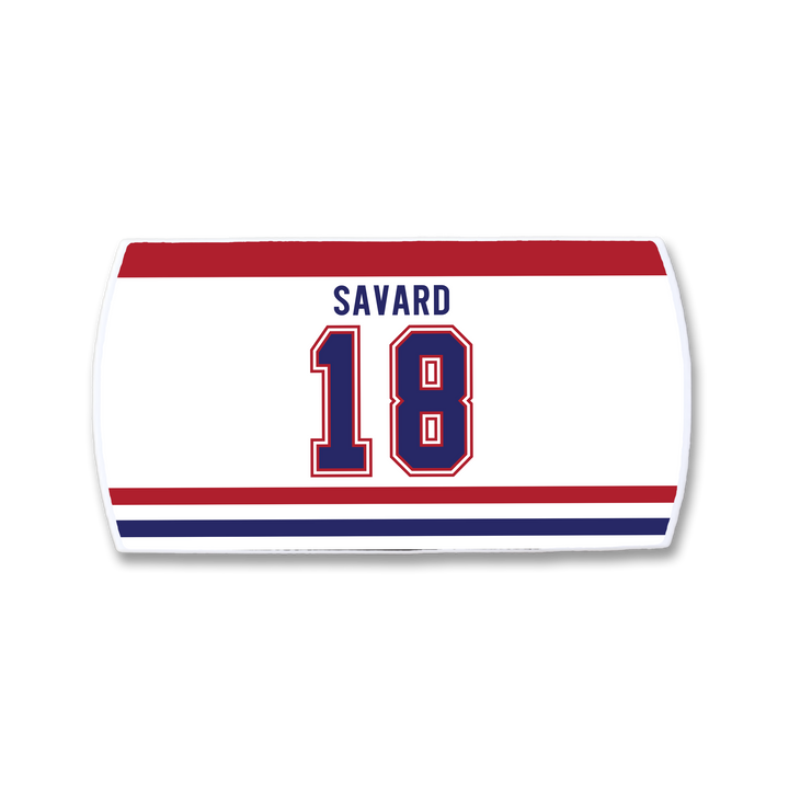 A ZippyBack™ Denis Savard hockey jersey nameplate in white, featuring "SAVARD" in blue above blue-outlined number 18, with red and blue stripes—honoring Denis Savard’s iconic legacy.