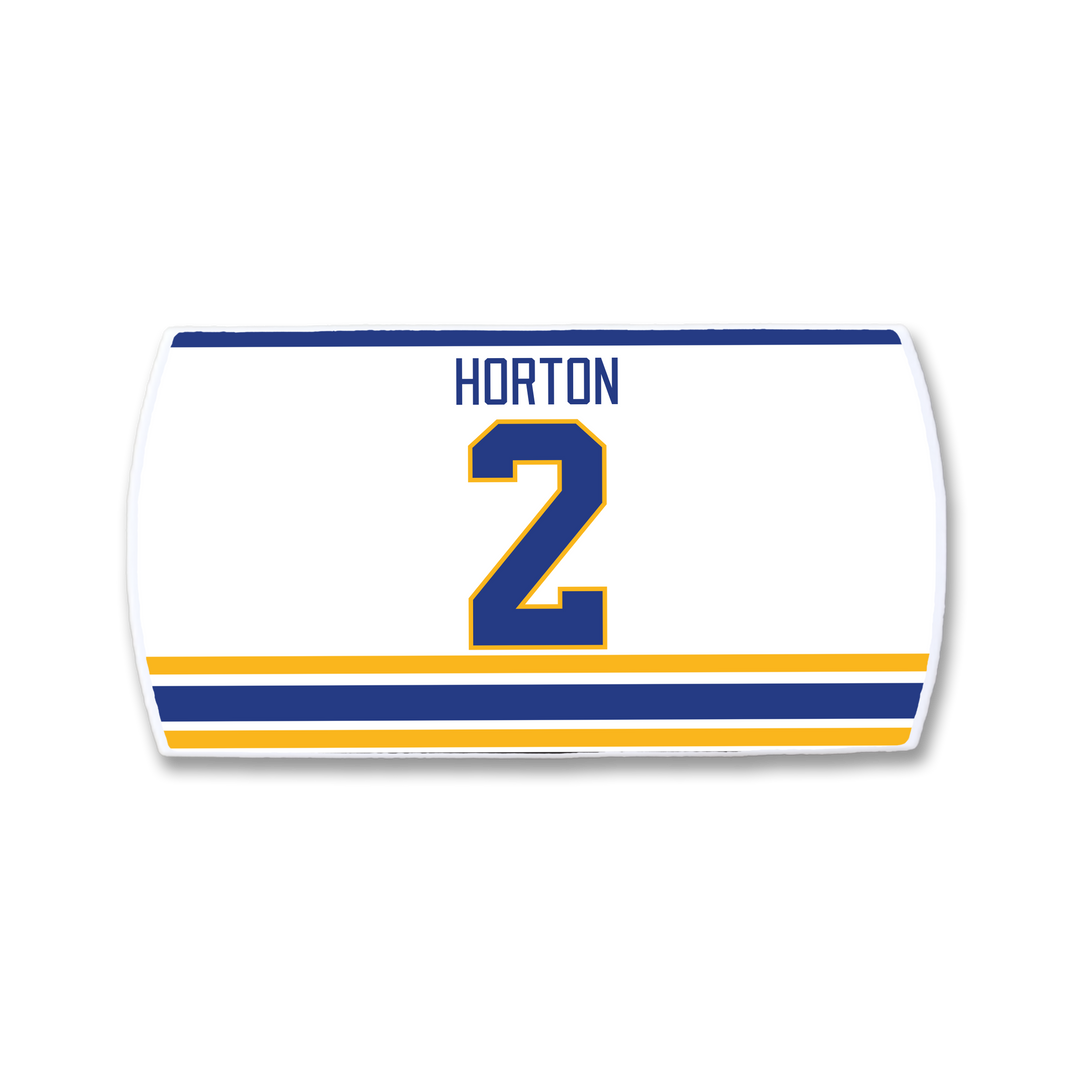 The ZippyBack™ Tim Horton hockey jersey nameplate features "HORTON" and number 2 in blue and gold, with matching stripes near the bottom, inspired by legendary defenseman Tim Horton.