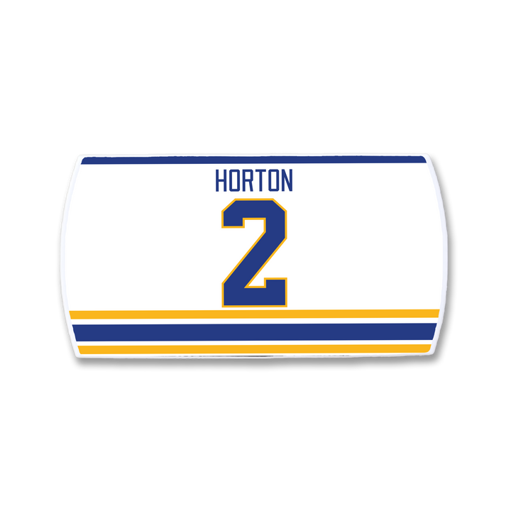 The ZippyBack™ Tim Horton hockey jersey nameplate features "HORTON" and number 2 in blue and gold, with matching stripes near the bottom, inspired by legendary defenseman Tim Horton.