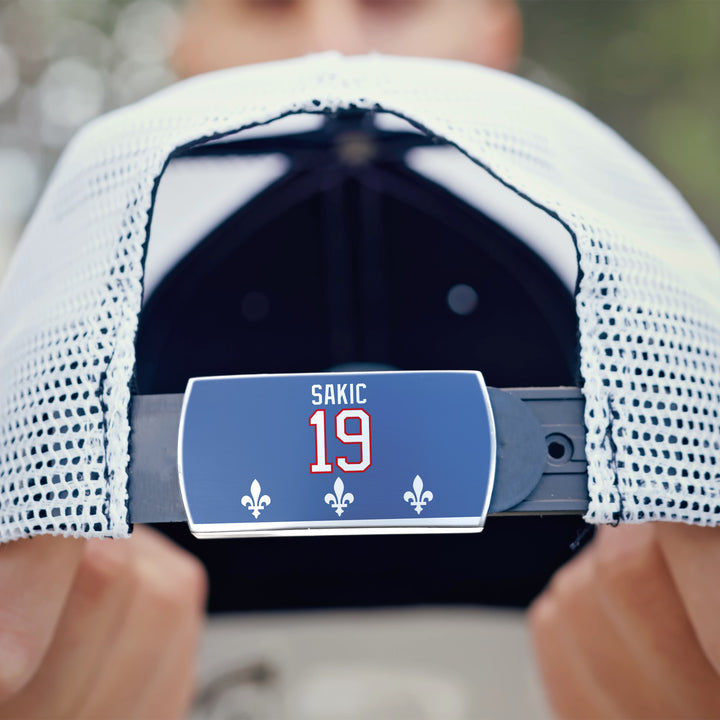 Close-up of the back of a white mesh ZippyBack™ cap, featuring a blue label with Joe Sakic&
