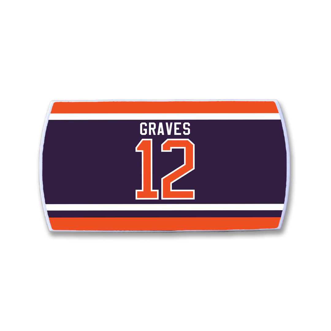 The ZippyBack™ Adam Graves sports towel features "GRAVES" above a bold number 12 on navy-blue and orange, with white and orange stripes along the top and bottom—perfect for showcasing your game-day spirit.