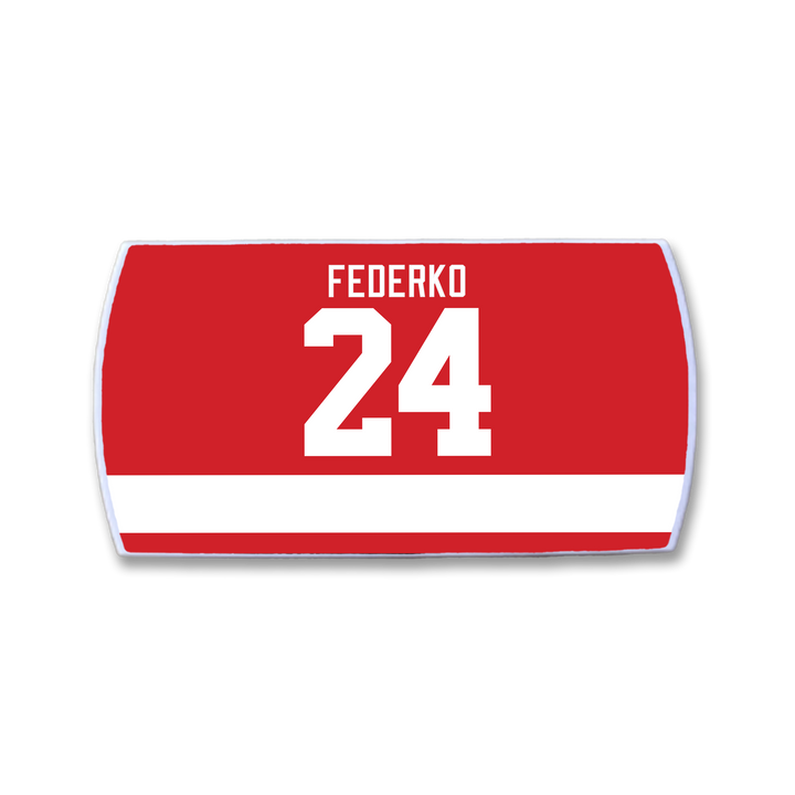 The ZippyBack™ Bernie Federko nameplate features "BERNIE FEDERKO" in white capitals above the number 24 on a red hockey jersey, with a horizontal white stripe below, honoring his legendary vision and passing skills.