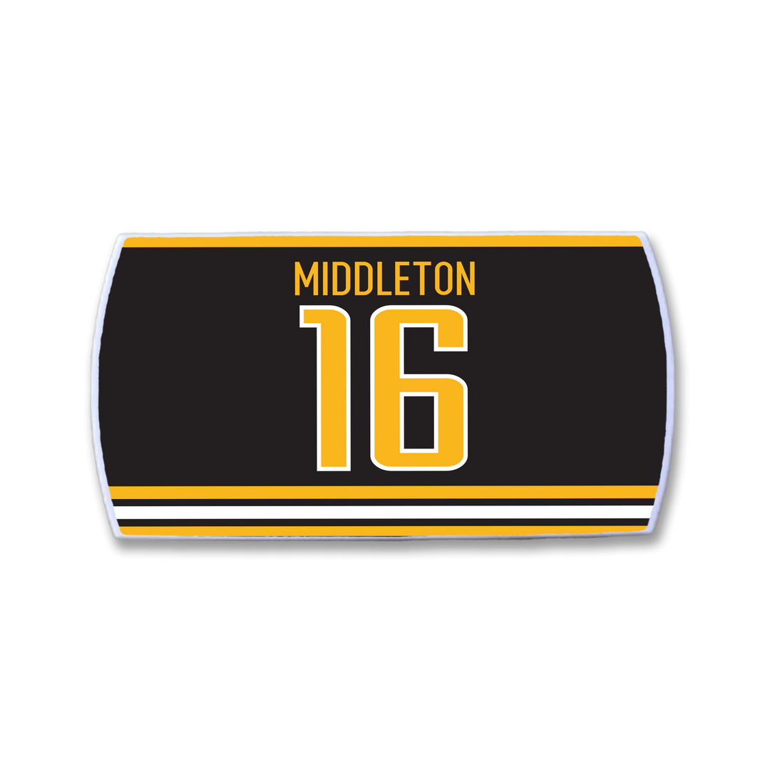 The ZippyBack™ Rick Middleton black and gold sports jersey patch features "Middleton" above a large 16, gold bottom stripes, and honors legendary winger Rick Middleton’s legacy as an offensive star.