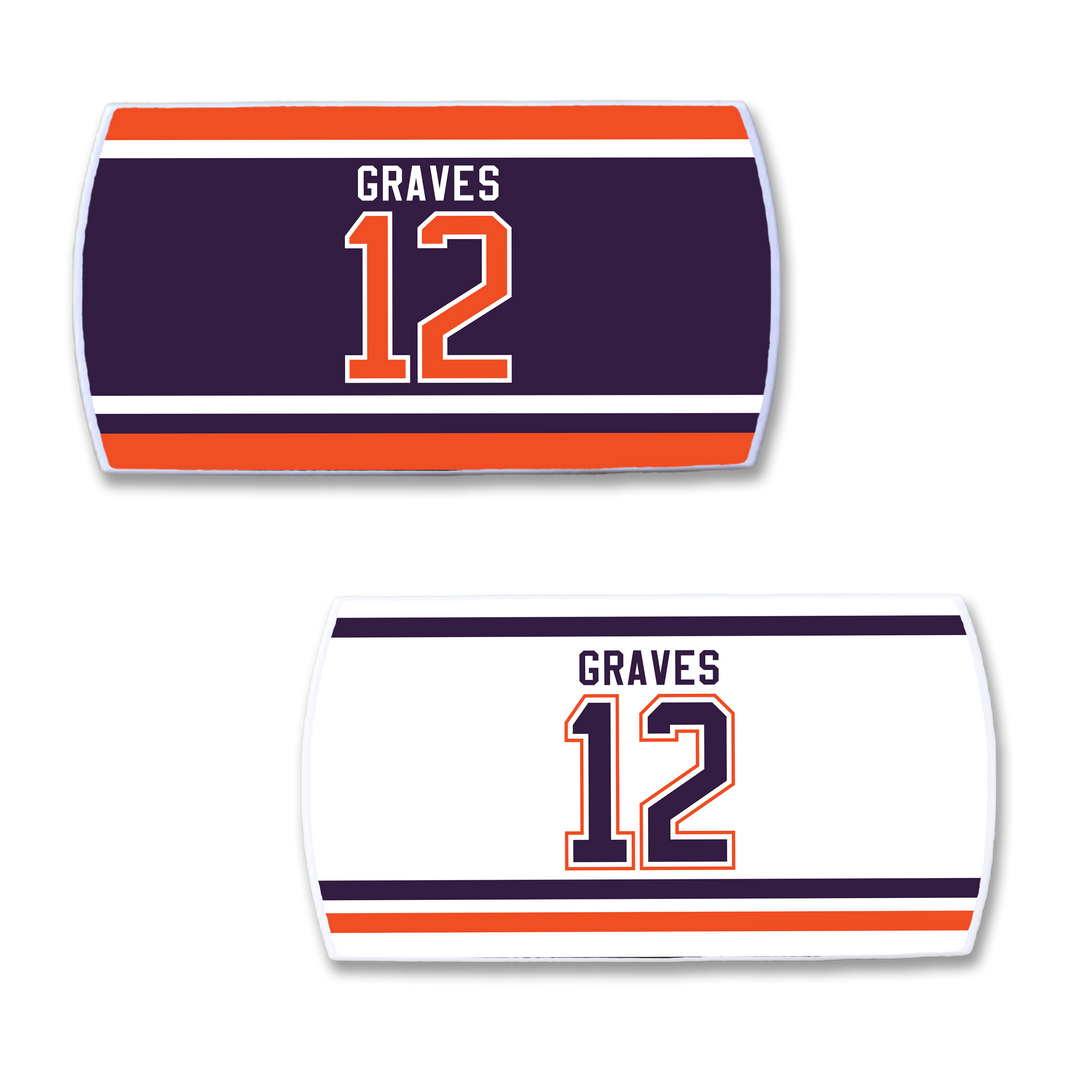 Two rectangular sports towels by ZippyBack™—one dark purple, one white—feature orange and purple stripes. Both display "GRAVES" and number 12 in bold, celebrating Adam Graves and the intensity of the game.