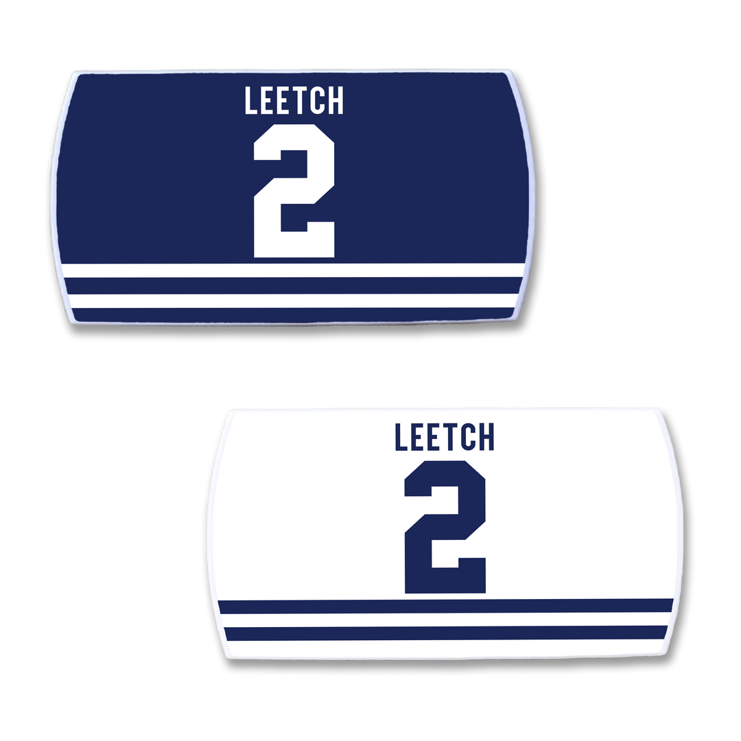 Two ZippyBack™ Brian Leetch hockey jersey nameplates 2: one dark blue with white accents, one white with dark blue details—ideal collectibles for any hockey fan.