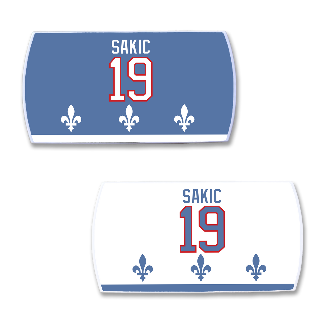ZippyBack™ Joe Sakic: Two hockey jersey nameplates—top is blue with SAKIC 19 in white/red and three fleur-de-lis; bottom is white with the same blue/red design.