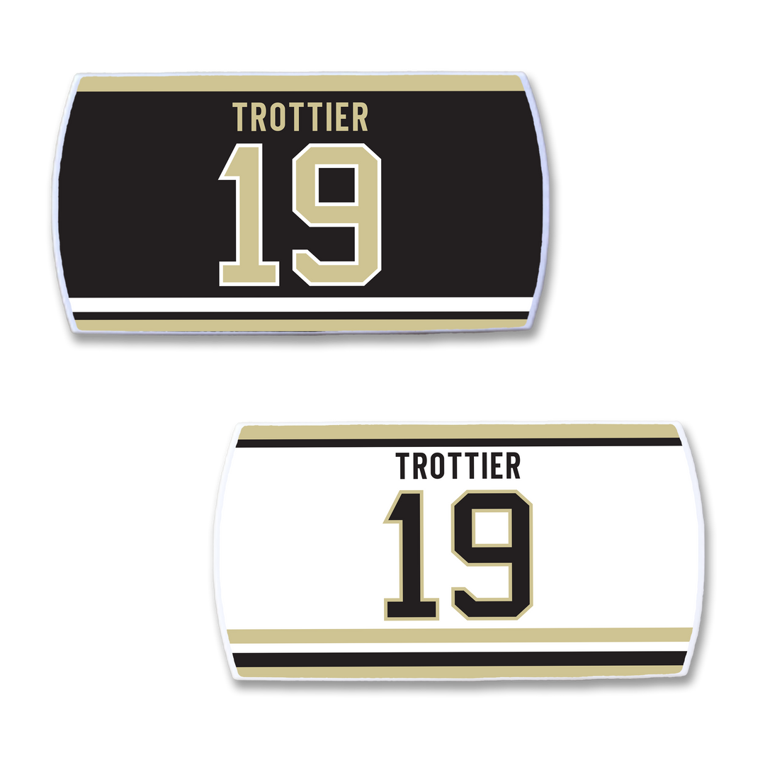 Show your support for leadership on the ice with ZippyBack™ Bryan Trottier jersey nameplates: one black gold/white TROTTER 19 and one white black/gold TROTTER 19, each featuring two horizontal stripes below.