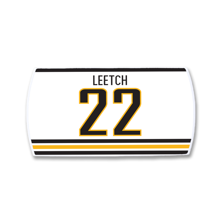 The ZippyBack™ Brian Leetch nameplate is a white hockey jersey patch with black and gold stripes, featuring LEETCH above the bold black-and-gold number 22, honoring the legendary defenseman.