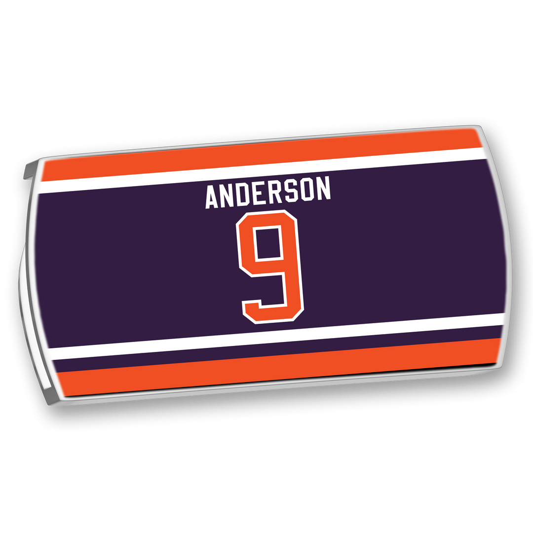 The ZippyBack™ Glenn Anderson nameplate is rectangular, featuring 9 in orange and white on a dark blue background with orange and white stripes.