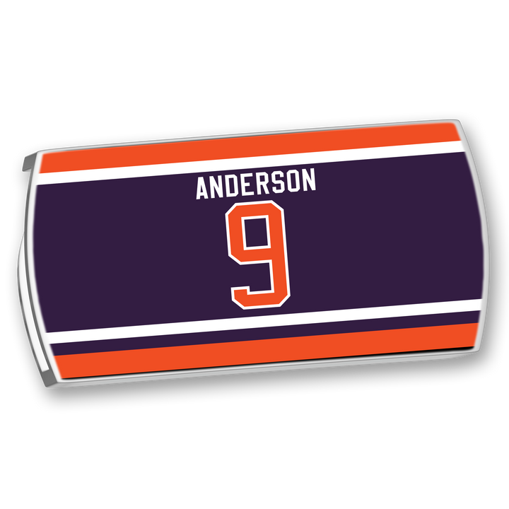 The ZippyBack™ Glenn Anderson nameplate is rectangular, featuring 9 in orange and white on a dark blue background with orange and white stripes.