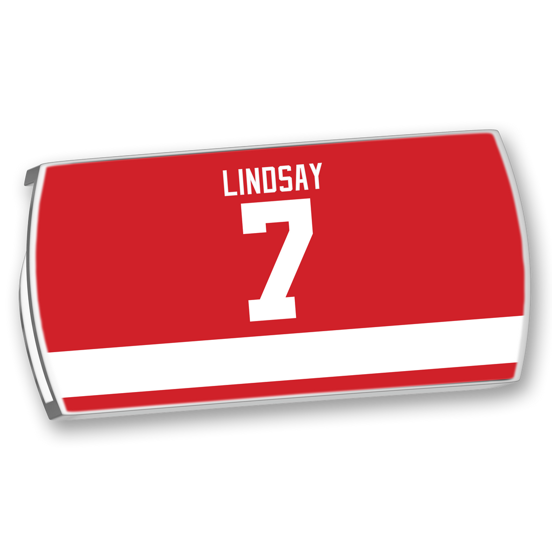 The ZippyBack™ Ted Lindsay jersey is red with a white stripe at the bottom and bold white "LINDSAY 7" lettering, honoring the hockey legend’s leadership and skill as a celebrated winger.