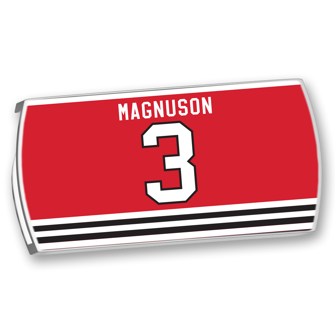 The ZippyBack™ Keith Magnuson nameplate features "MAGNUSON" and number 3 in bold white, black-outlined text on red above black and white stripes, honoring Magnuson’s toughness and physical play.