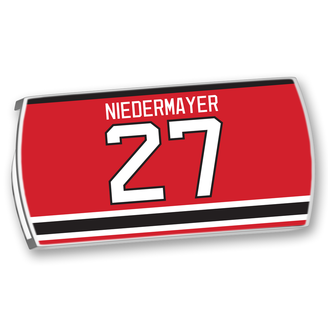 The ZippyBack™ Scott Niedermayer hockey jersey features a red nameplate with NIEDERMAYER in white above number 27 and black-and-white stripes—a tribute to his legendary leadership and excellence on the ice.