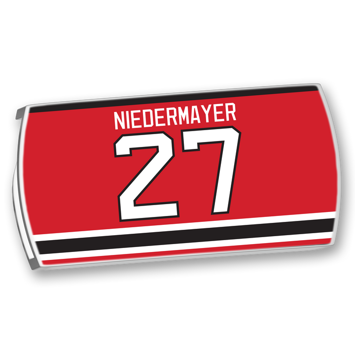 The ZippyBack™ Scott Niedermayer hockey jersey features a red nameplate with NIEDERMAYER in white above number 27 and black-and-white stripes—a tribute to his legendary leadership and excellence on the ice.
