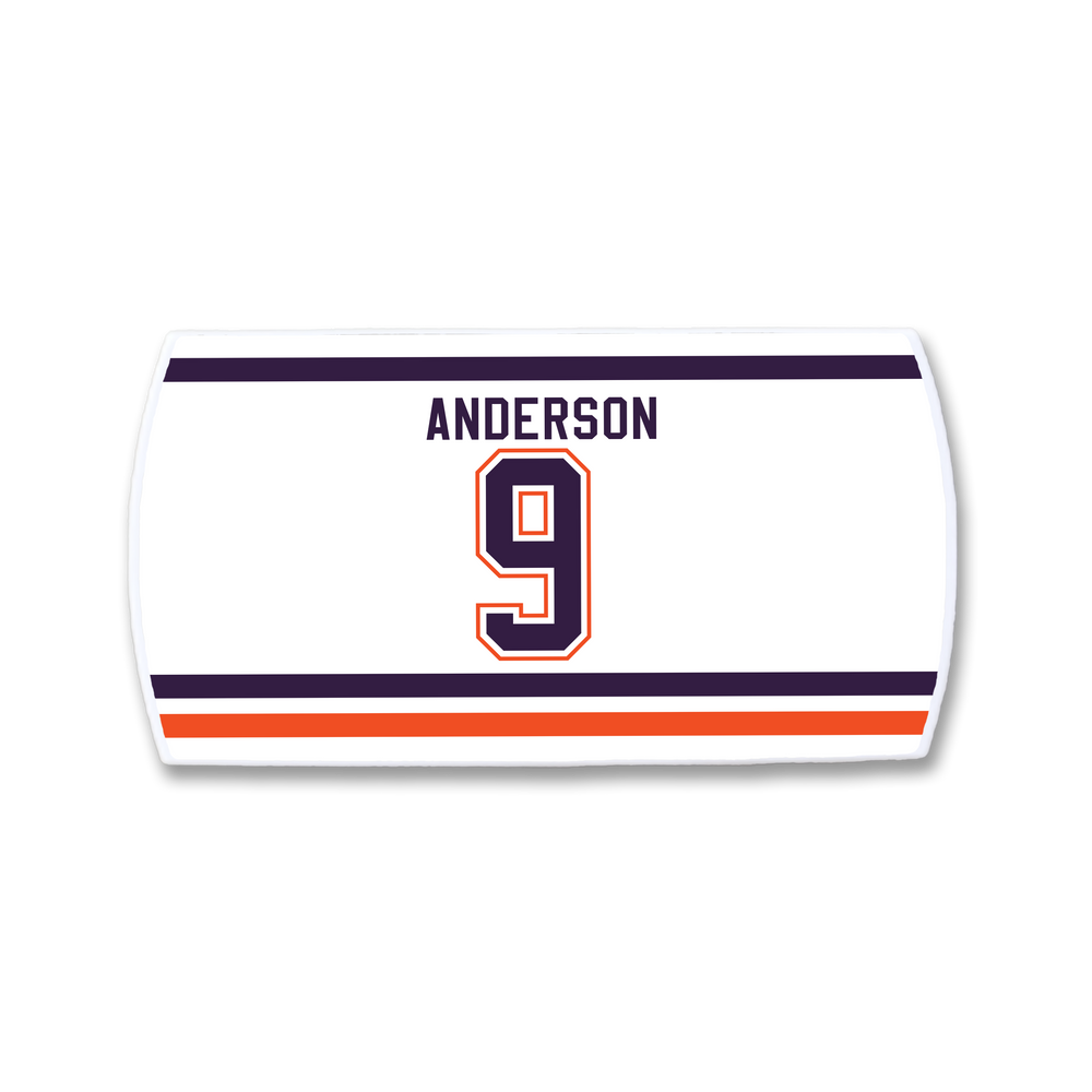 ZippyBack™ Glenn Anderson jersey nameplate: white with ANDERSON in navy blue, large orange-outlined number 9, and navy/orange/white stripes at the bottom—honoring the legendary postseason scorer.