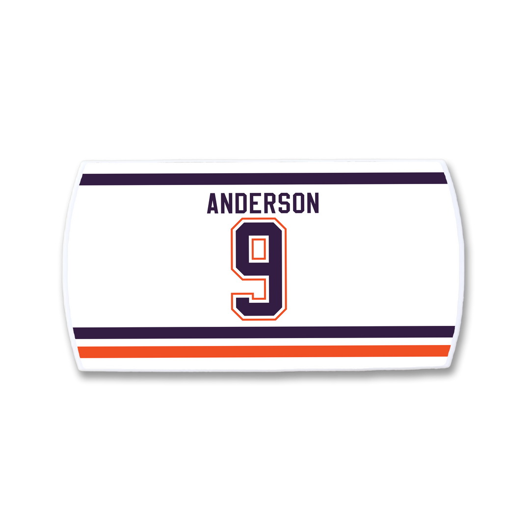ZippyBack™ Glenn Anderson jersey nameplate: white with ANDERSON in navy blue, large orange-outlined number 9, and navy/orange/white stripes at the bottom—honoring the legendary postseason scorer.