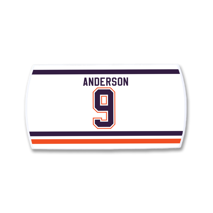 ZippyBack™ Glenn Anderson jersey nameplate: white with ANDERSON in navy blue, large orange-outlined number 9, and navy/orange/white stripes at the bottom—honoring the legendary postseason scorer.