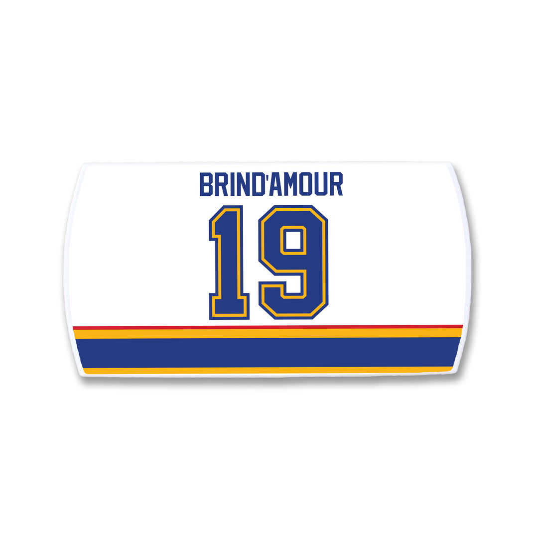 The ZippyBack™ Rod Brind’Amour jersey features a white nameplate with “BRIND’AMOUR” in blue above number 19, outlined in blue and gold, plus red, yellow, and blue stripes near the bottom.