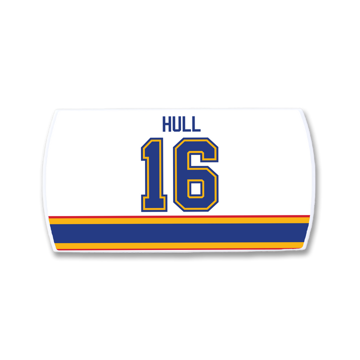 The ZippyBack™ Brett Hull nameplate is a white hockey jersey patch with HULL in blue capitals above number 16, honoring the legendary goal scorer, and finished with blue, yellow, and orange stripes along the bottom edge.