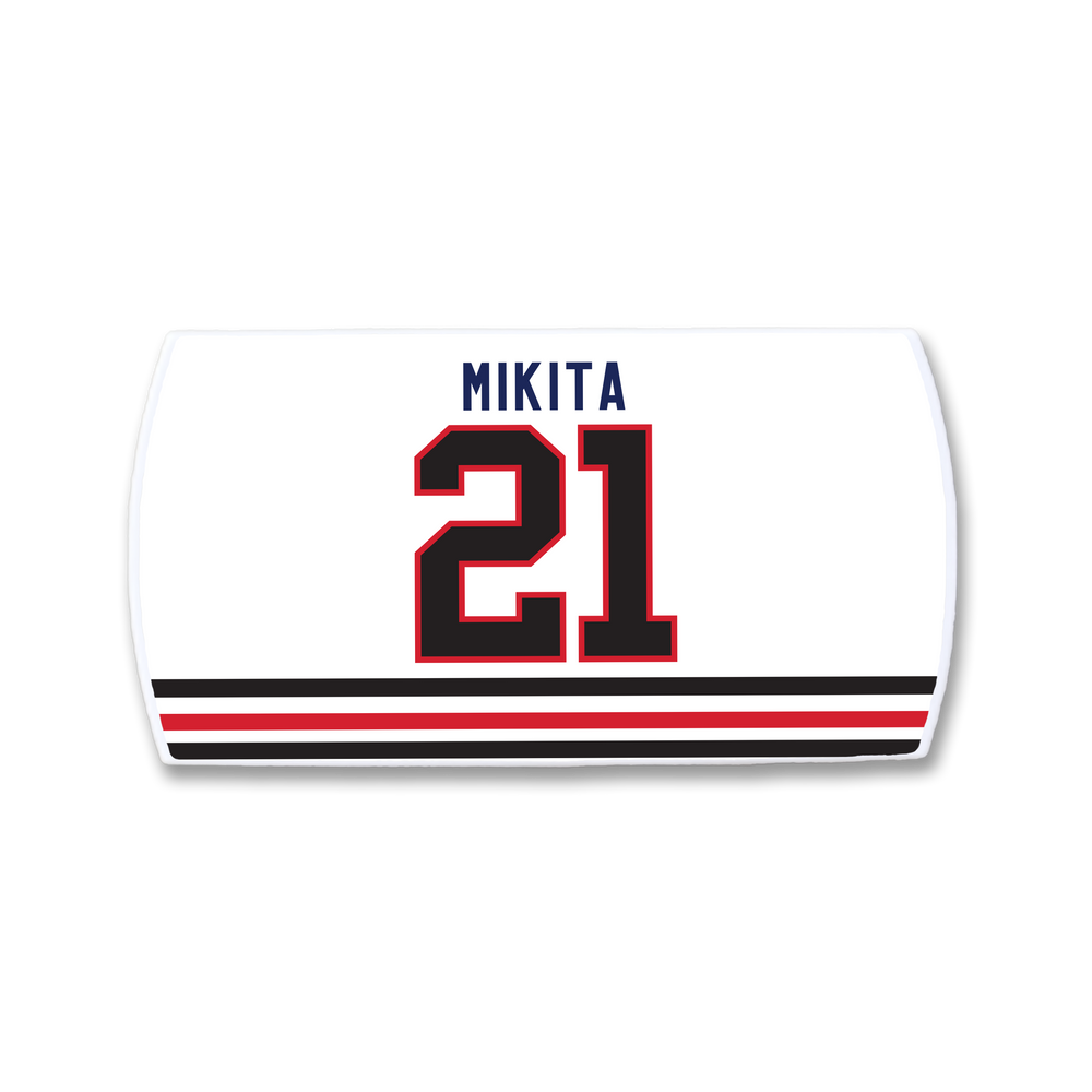 The ZippyBack™ Stan Mikita hockey nameplate showcases his name in blue uppercase letters above a large red and black 21, complete with bold black and red bottom stripes—a tribute to the legendary player.