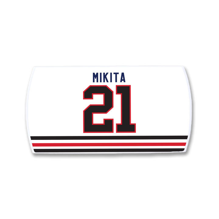 The ZippyBack™ Stan Mikita hockey nameplate showcases his name in blue uppercase letters above a large red and black 21, complete with bold black and red bottom stripes—a tribute to the legendary player.