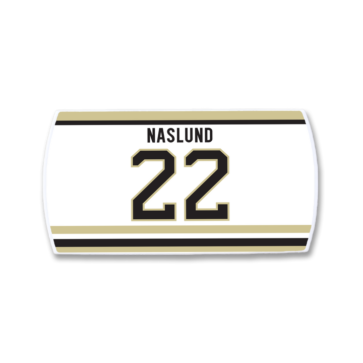 The ZippyBack™ Markus Näslund nameplate features white fabric with gold and black stripes, his name above the number 22 in bold black with gold outline—a fitting tribute to the legendary scorer’s offensive impact.