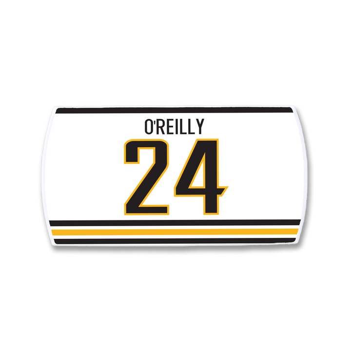A ZippyBack™ white jersey nameplate featuring OREILLY in black above the number 24 in bold black and gold, bordered with matching stripes—a tribute to rugged winger Terry O’Reilly.