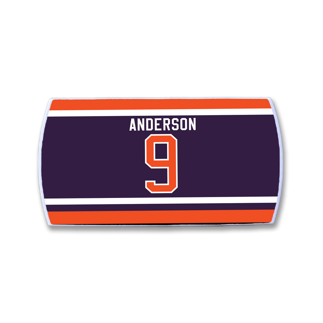 A ZippyBack™ rectangular sports jersey nameplate featuring "ANDERSON" and the number 9 in bold white and orange on a dark background with stripes, honoring Glenn Anderson&