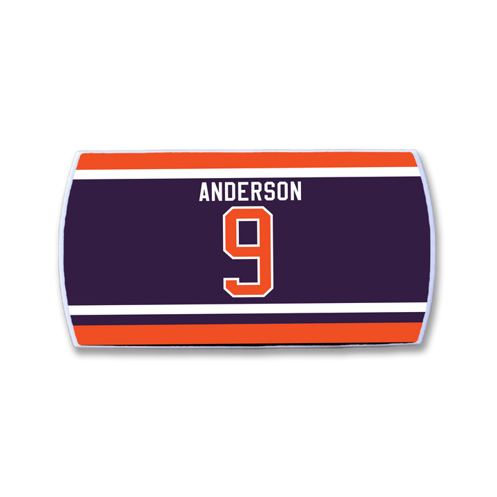 A ZippyBack™ rectangular sports jersey nameplate featuring "ANDERSON" and the number 9 in bold white and orange on a dark background with stripes, honoring Glenn Anderson&