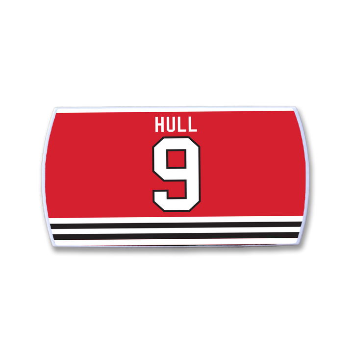The ZippyBack™ Bobby Hull jersey features bold red with HULL and number 9 in white and black above black-and-white stripes—a must-have for any Bobby Hull fan.