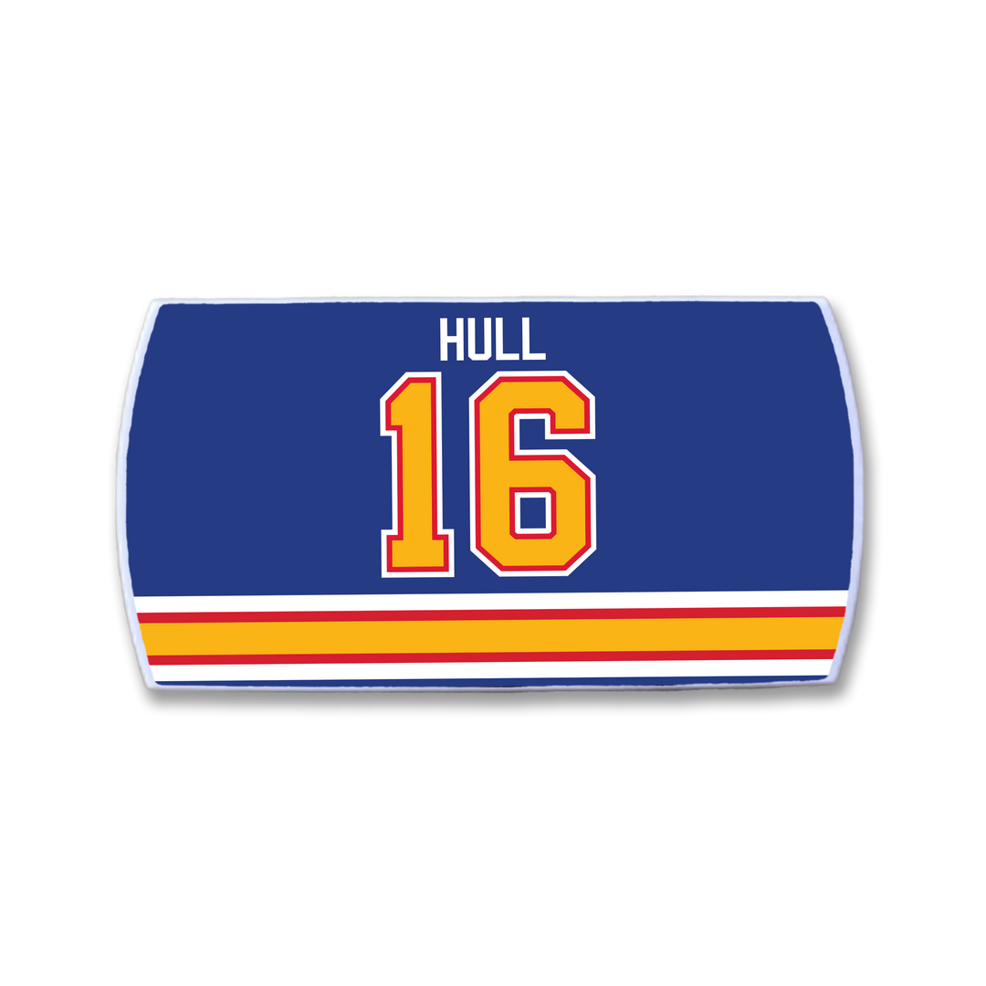 The ZippyBack™ Brett Hull patch features "HULL" in white over a bold yellow 16 with red outline on blue, celebrating the iconic goal scorer, plus horizontal yellow, red, and white stripes at the bottom.