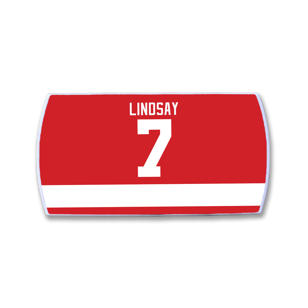 A red and white ZippyBack™ Ted Lindsay sports jersey featuring the name LINDSAY and number 7 in large white letters on the back, honoring hockey legend Ted Lindsay’s legacy.