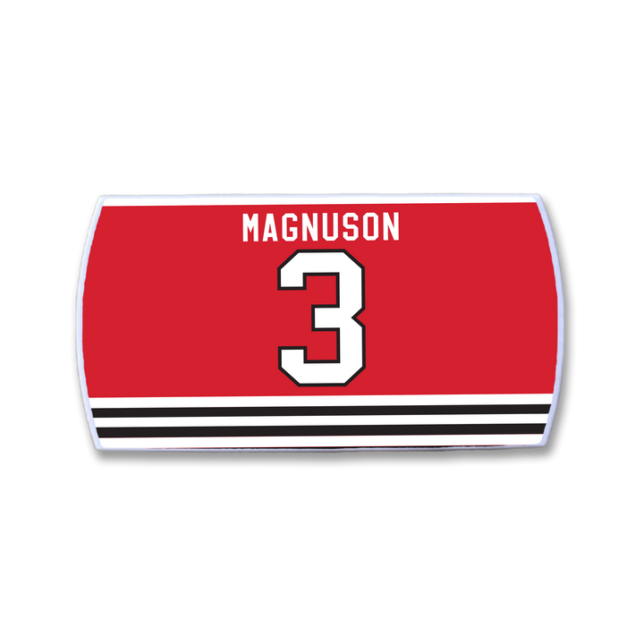 The ZippyBack™ Keith Magnuson red rectangular hockey jersey patch features his name in white above a large white number 3 outlined in black, with black and white stripes along the bottom.
