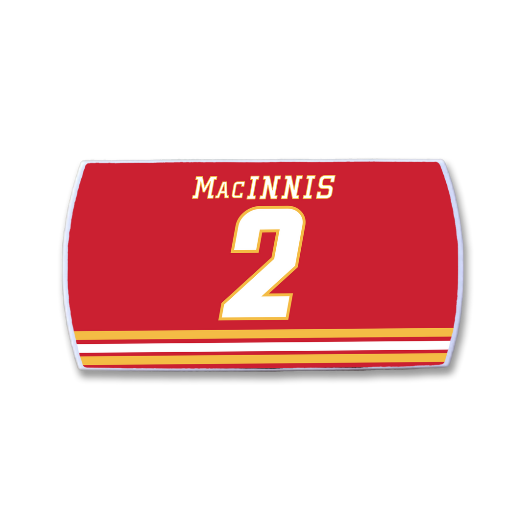 Red ZippyBack™ hockey jersey nameplate featuring "MacINNIS" in white above a large yellow and white number 2, with three yellow and white stripes at the bottom—a tribute to legendary Al MacInnis.