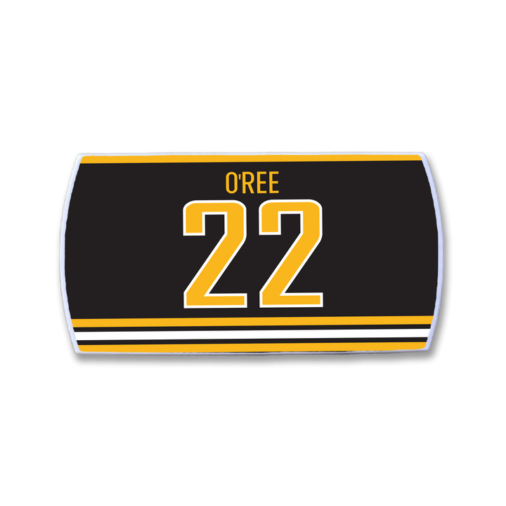 The ZippyBack™ Willie O’Ree patch is a black hockey jersey strip with gold and white stripes, displaying OREE above a bold gold 22—honoring the legendary forward who changed hockey history.