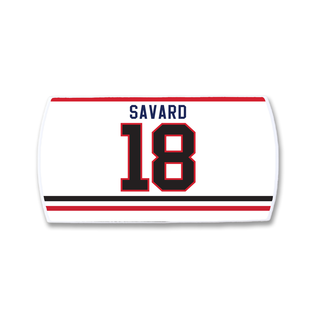 ZippyBack™ Denis Savard hockey jersey nameplate in white displays SAVARD in blue above red and black number 18, accented by two black and red stripes—celebrating Savard’s legendary creativity on the ice.
