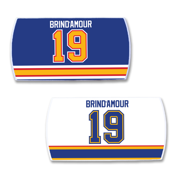 Two rectangular ZippyBack™ hockey jersey nameplates: both honor Rod Brind’Amour, one blue with BRINDAMOUR and 19 in red/yellow, and one white with matching details in blue/yellow. Both feature colorful stripes.