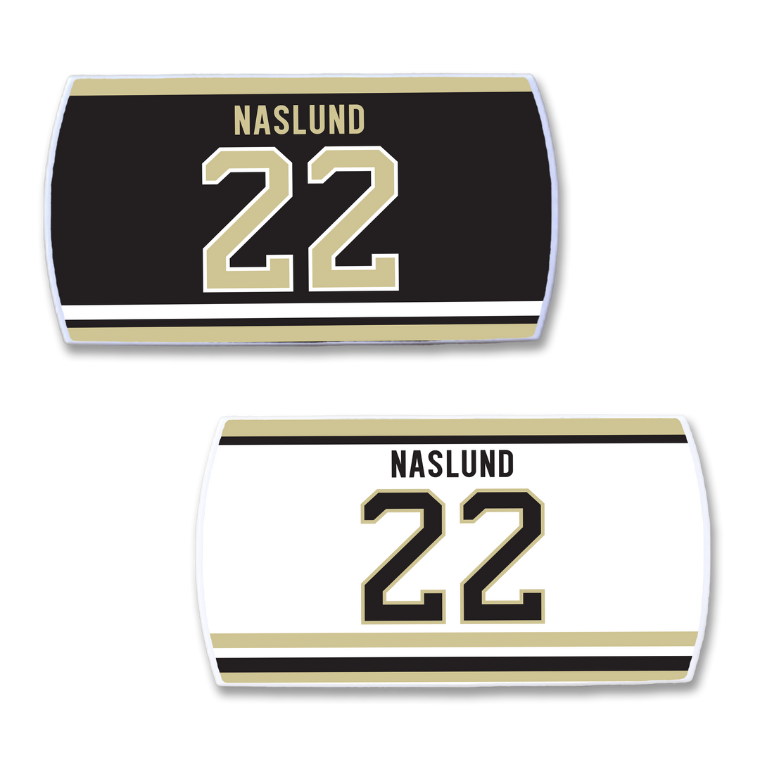 Two ZippyBack™ nameplates honoring Markus Näslund—one black and one white, each with “NASLUND” and number 22 in gold, beige, and black accents.