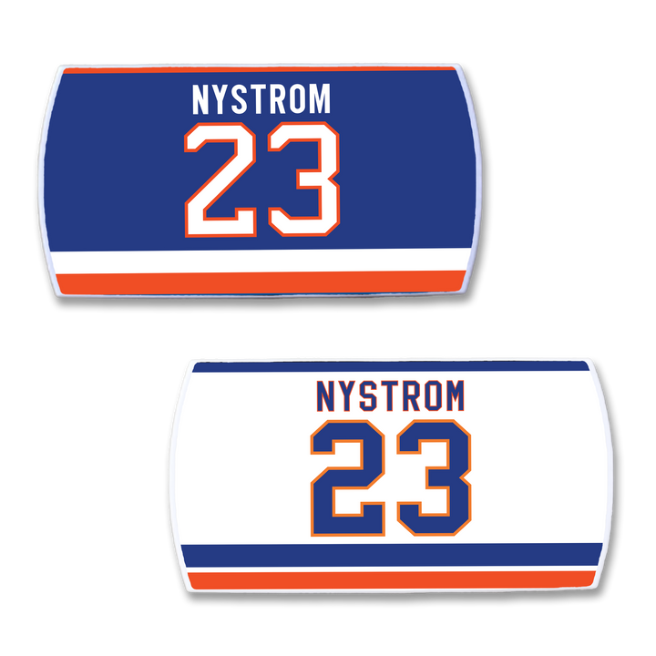 Two rectangular ZippyBack™ nameplates featuring Bob Nystrom’s name and number 23 in blue, orange, and white—one with a blue background, one white—for the ultimate tribute to championship hockey.